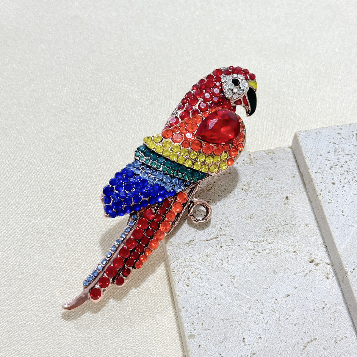 Close-up of alloy parrot brooch