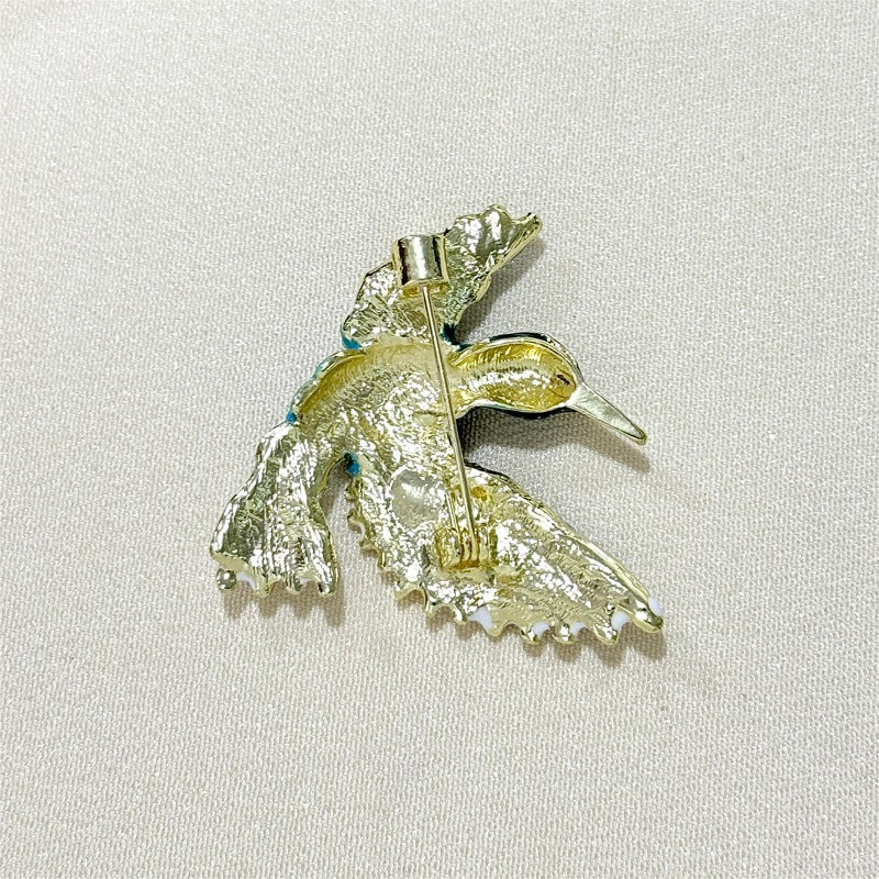 Retro style bird lapel pin