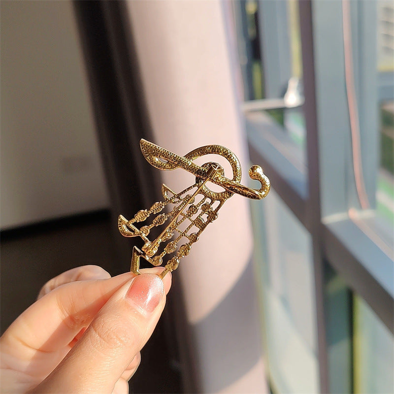 musical note brooch gray color rhinestones
