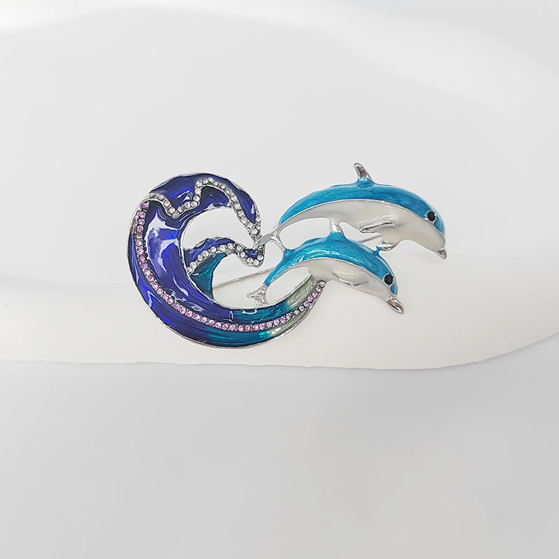 Stylish dolphin brooch design on jacket