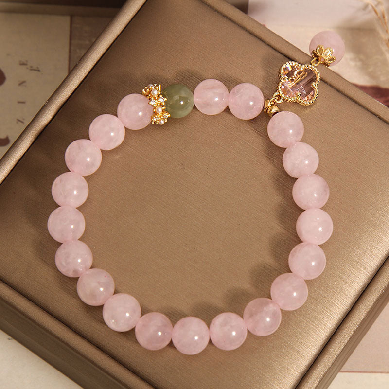 Elegant pink quartz bracelet with clover pendant
