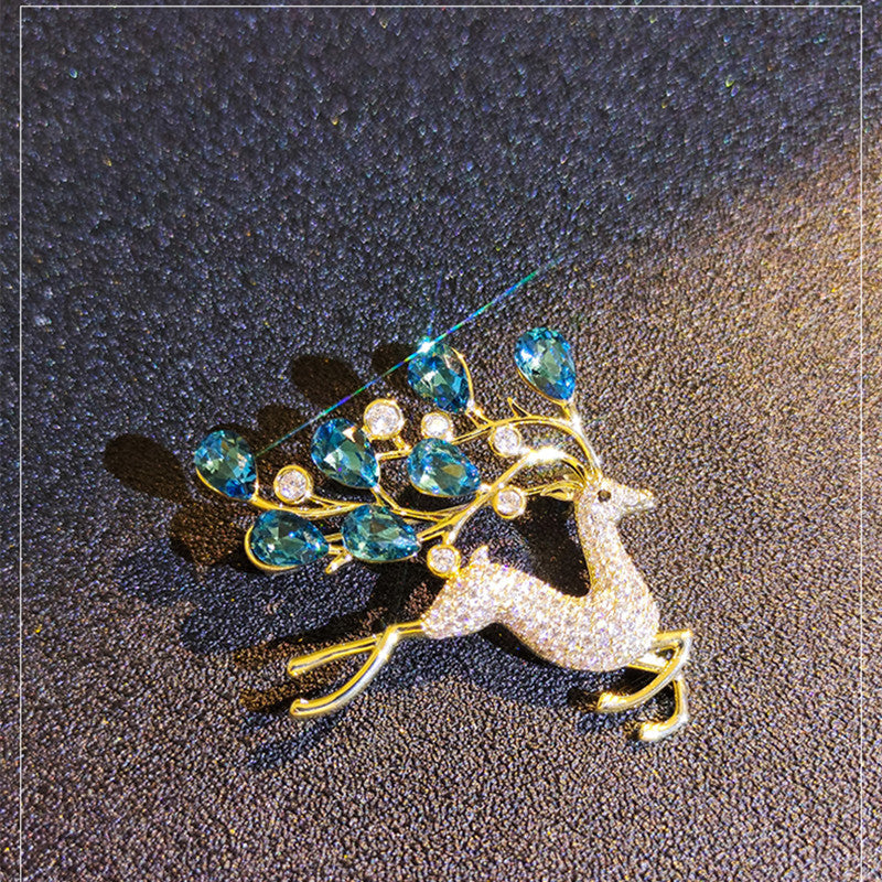Blue crystal deer brooch front view