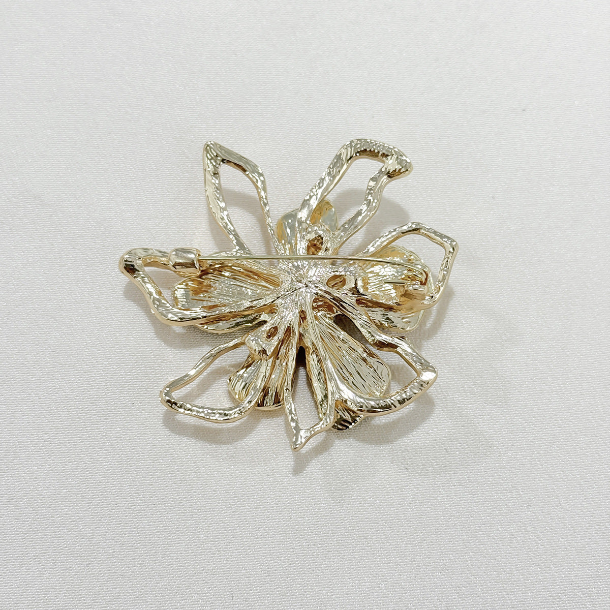 Rhinestone bowknot brooch on a coat