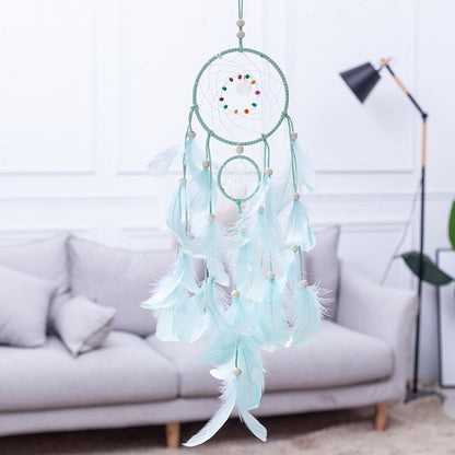 Wind Chime shown hanging in a bright sunny room