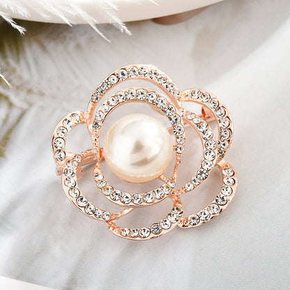 Rhinestone embellished brooch on a dress image 5