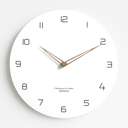 Stylish quartz wall clock hanging on wall