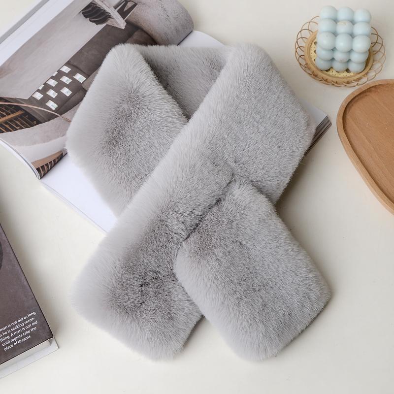 Lavish plush scarf against a snowy background