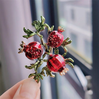 Creative fruit brooch on display