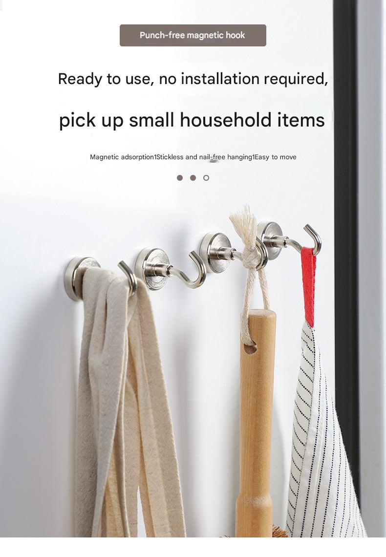 Magnetic hook holding kitchen utensils