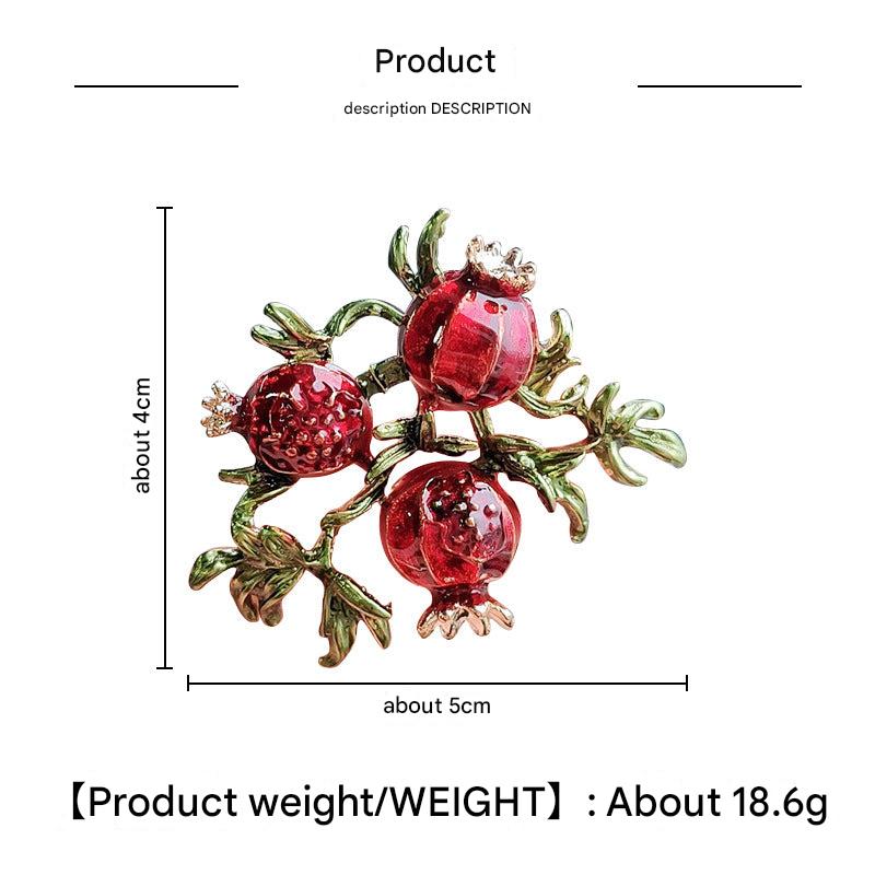 Retro fruit brooch attached to a bag