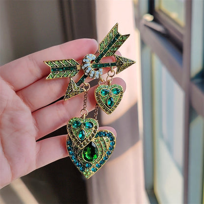Elegant red Cupid arrow pin with stylish design