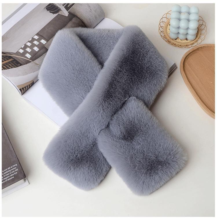 Lavish plush scarf against a snowy background