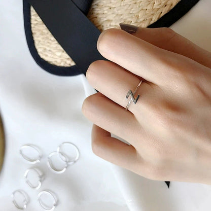 Stylish couple wearing Alphabet Rings 3