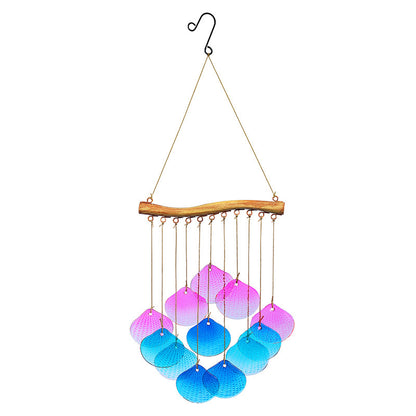 Iron leaf wind chime hanging in garden