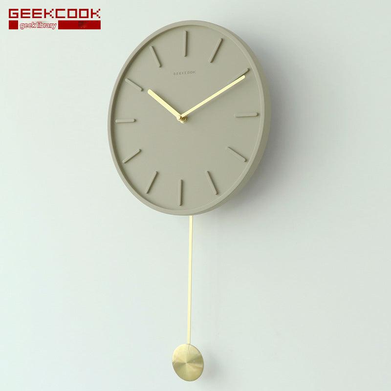 Minimalist wall clock with copper accents