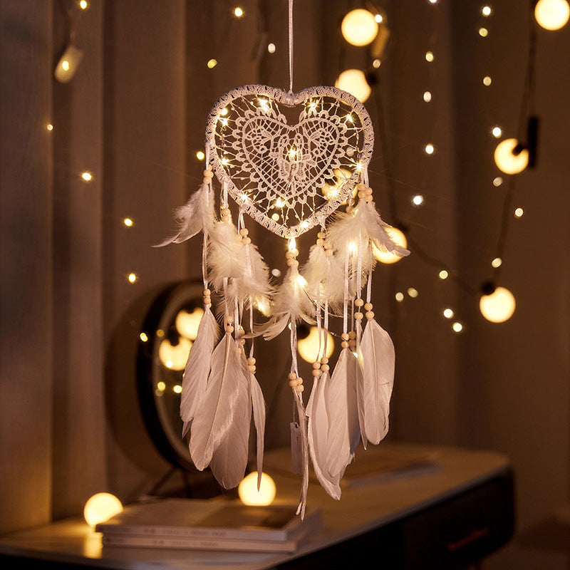 Heart-shaped dreamcatcher with lights for wedding decor