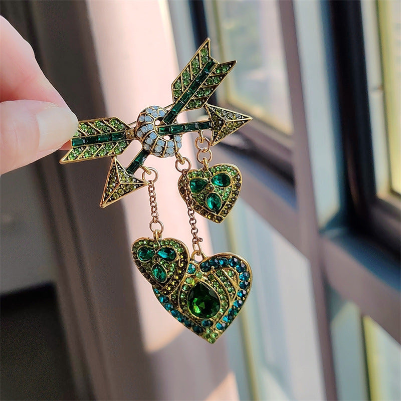 Close-up of unique tassel brooch for women