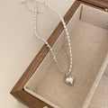 Broken Silver Heart Pearl Necklace