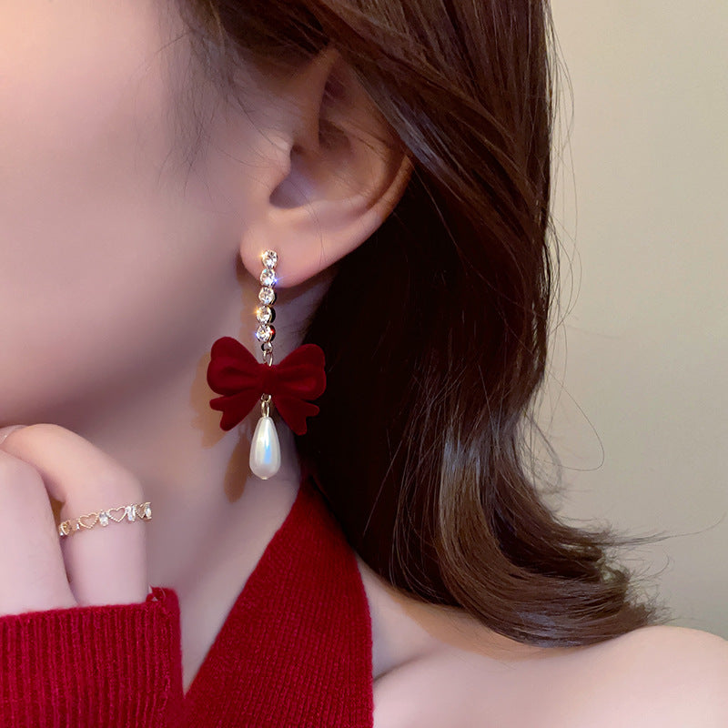 Chic women's bow earrings close up