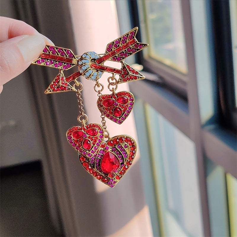 Vintage Cupid heart arrow brooch in pink with tassels