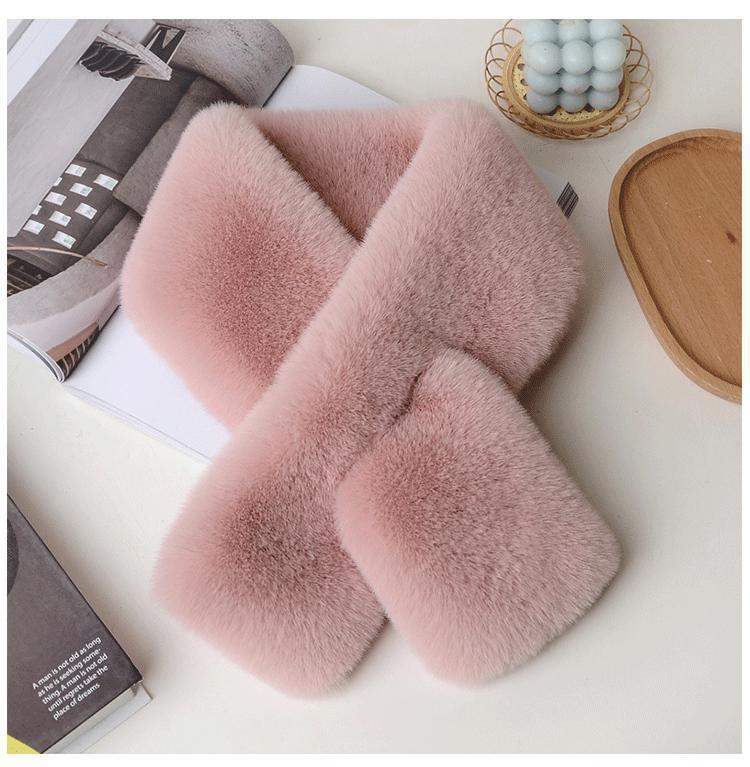 Lavish plush scarf against a snowy background