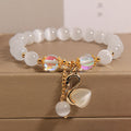 Cat's Eye Stone + Gold Swan c10-12