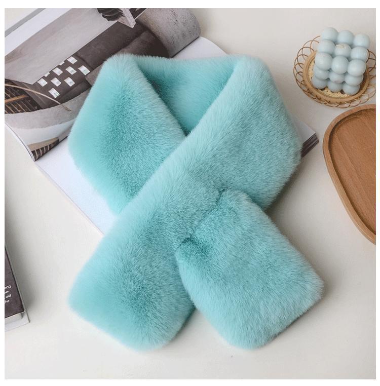 Lavish plush scarf against a snowy background