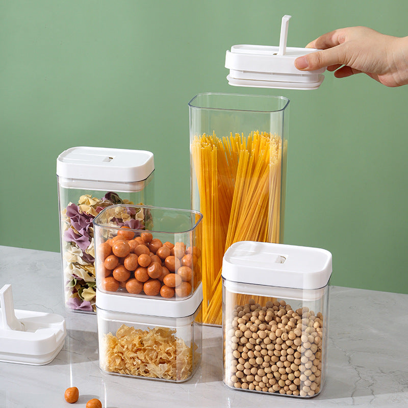 Multi-size food storage jars on countertop