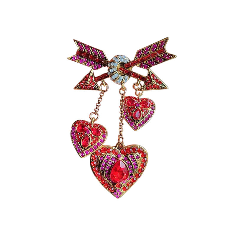 Vintage Cupid heart arrow brooch in pink with tassels