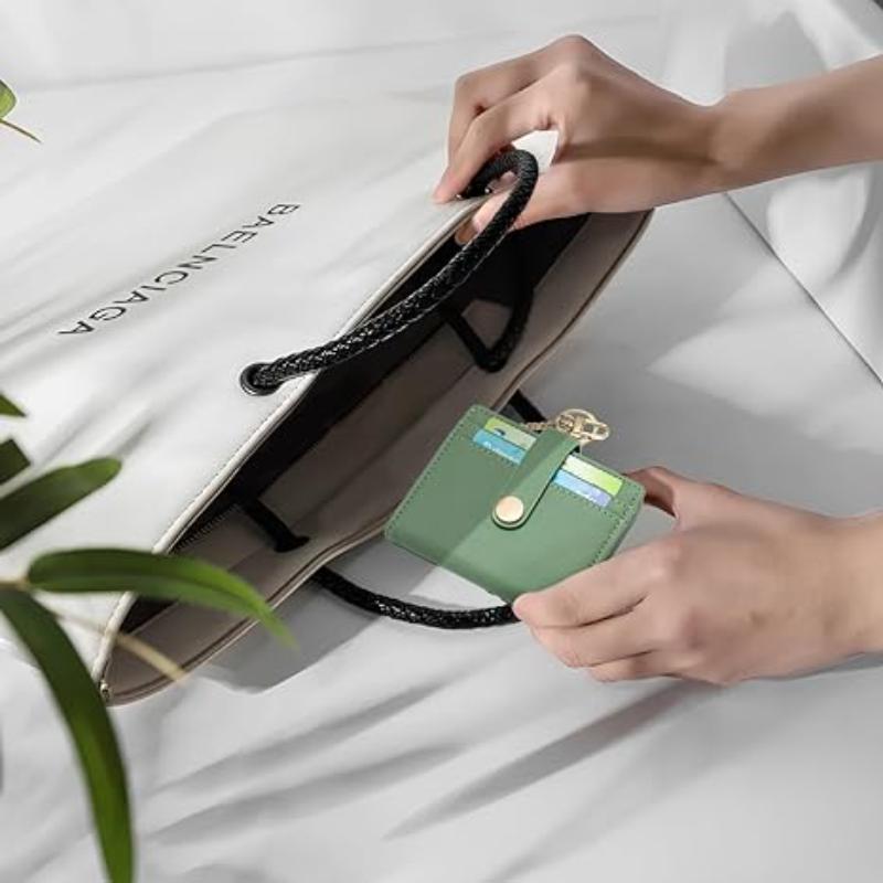 women's short wallet in hand