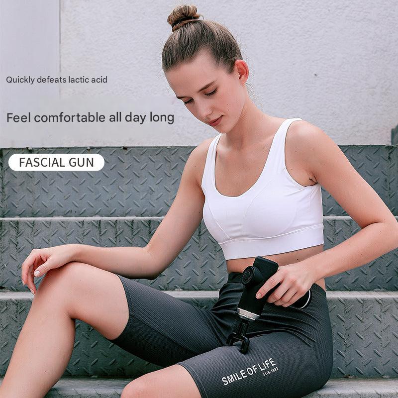 Image of the Portable Electric Massage Gun with charging cable