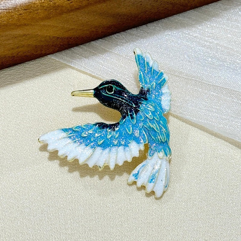 Retro style bird lapel pin